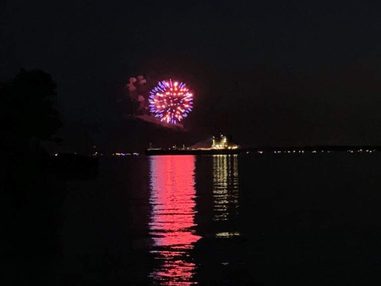 Fourth of July in Clayton, NY with fireworks over a ship